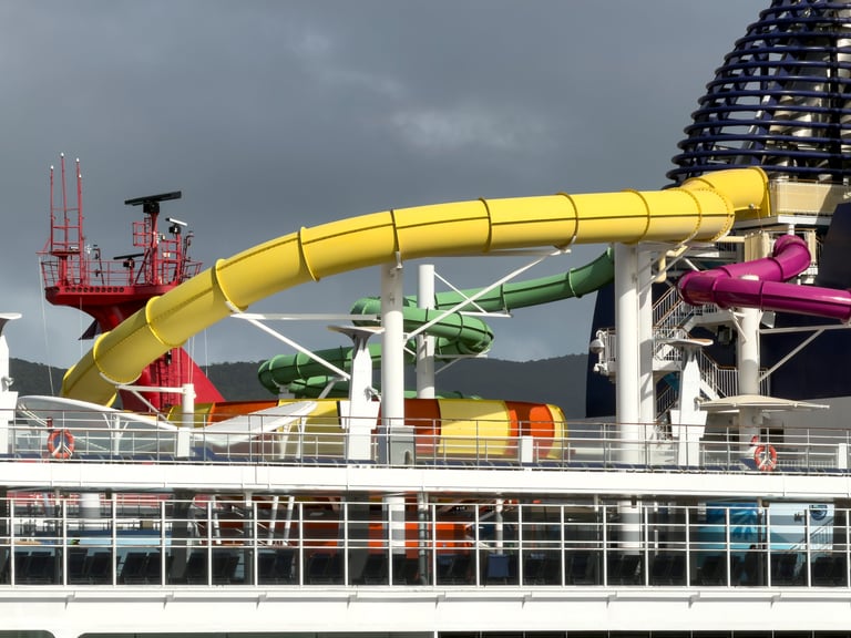 Philipsburg, St Maarten, Caribbean: Aqua park water slide attractions on upper deck of NCL Norwegian Epic cruise liner